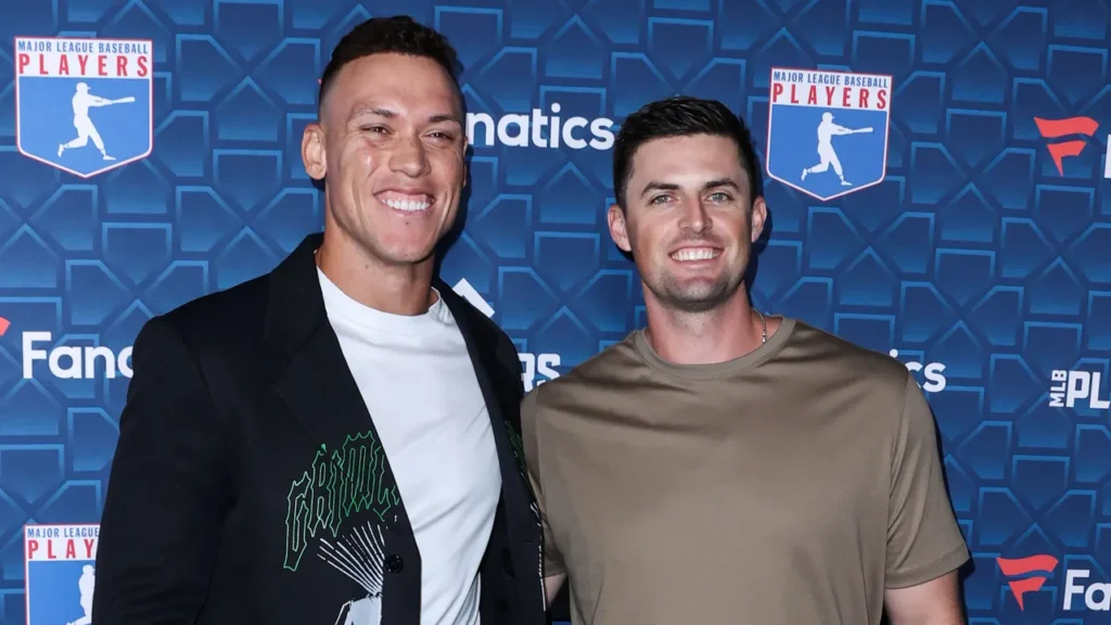 Aaron Judge and clay holmes arrive at the players party