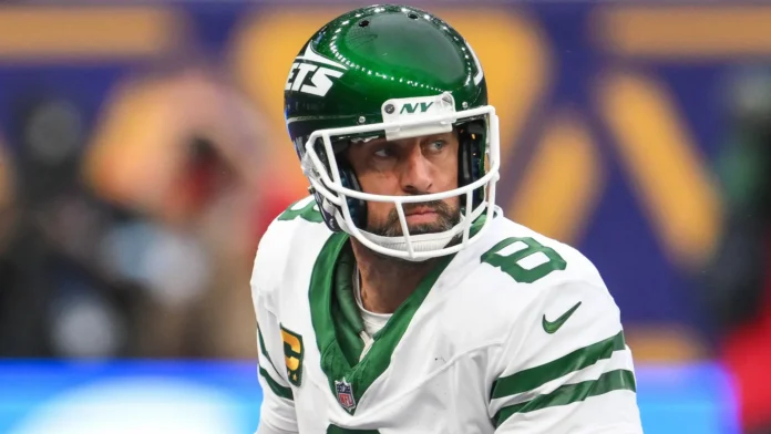 Aaron Rodgers looking on during the game.