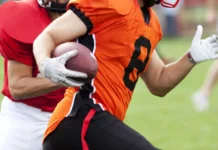 American football players fighting for the ball