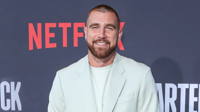 American football tight end for the Kansas City Chiefs of the National Football League Travis Kelce arrives at the Los Angeles Premiere Of Netflixs Quarterback Season 1 held at the Netflix Tudum Theater on July 11 2023 in Hollywood Los Angeles