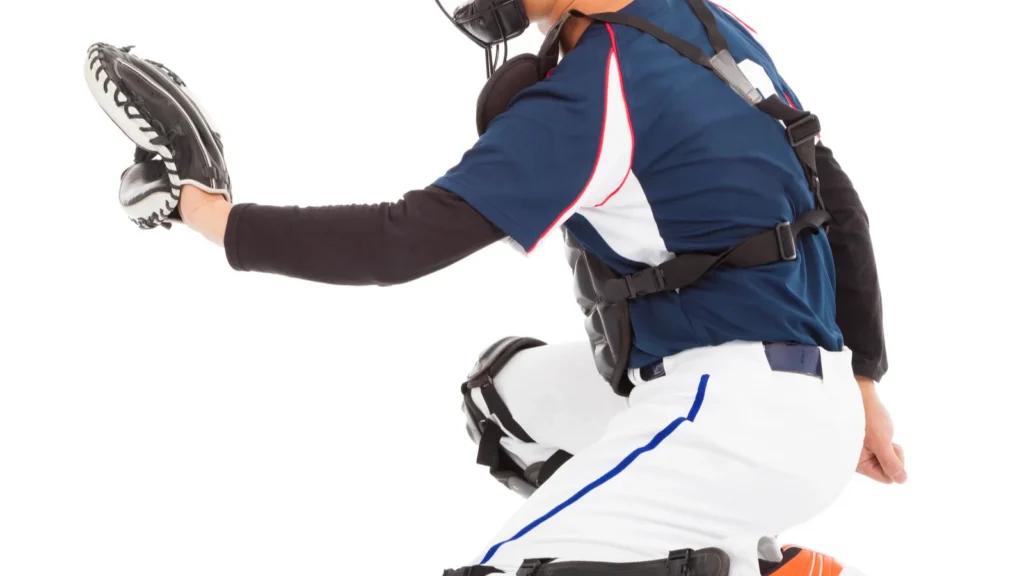 Baseball player catcher kneeling gesture to catch.
