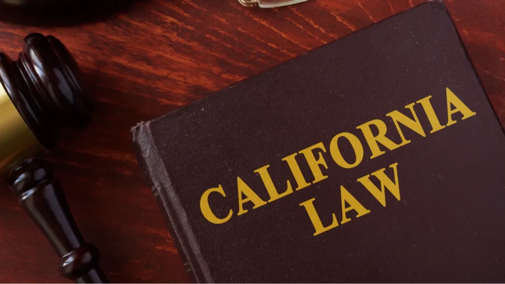 Book with title California law and a gavel