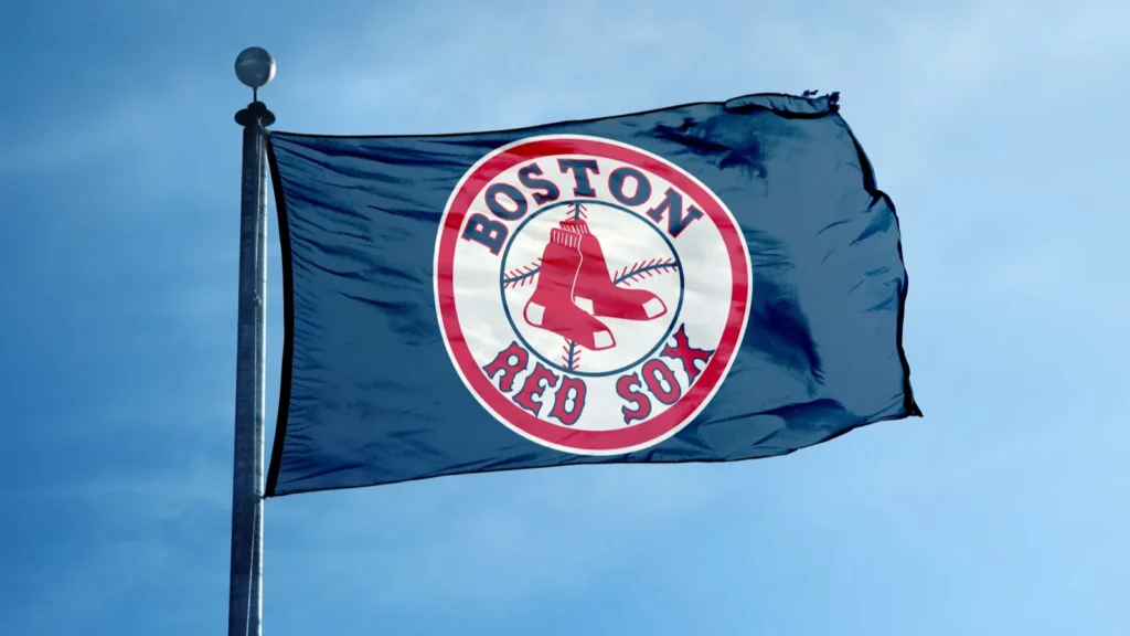 Boston Red Sox baseball team flag on a pole.