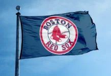 On-field exchange involving Willson Contreras leads to MLB bench-clearing incident Boston Red Sox baseball team flag on a pole
