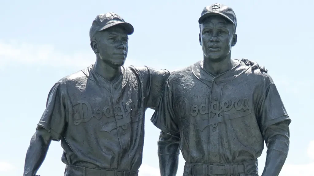 BROOKLYN NEW YORK  MAY 11 2021 Jackie Robinson and Pee Wee Reese Statue in front of MCU ballpark in Brooklyn