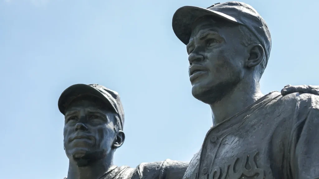 BROOKLYN NEW YORK  MAY 11 2021 Jackie Robinson and Pee Wee Reese Statue in front of MCU ballpark in Brooklyn