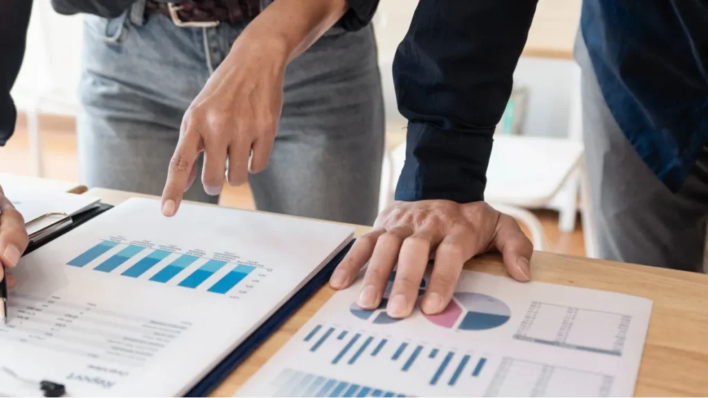 Business People Meeting to analyse and discuss and brainstorming