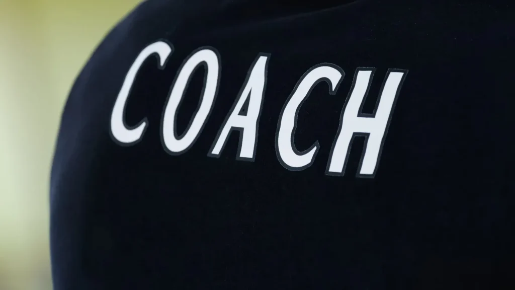 Coach logo on black tshirt