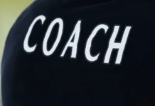 Coach logo on a black shirt