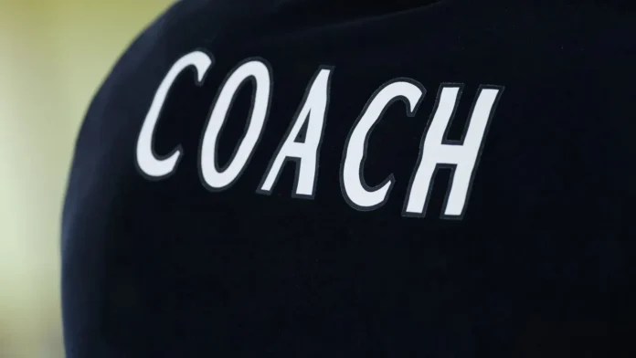 Coach logo on a black shirt