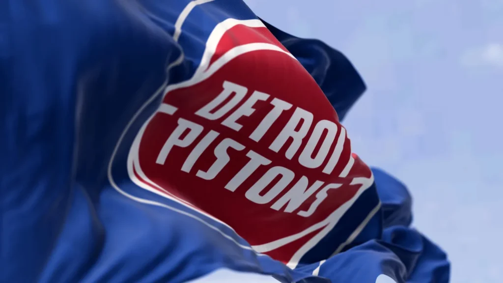 Detroit Pistons flag waving on a clear day.
