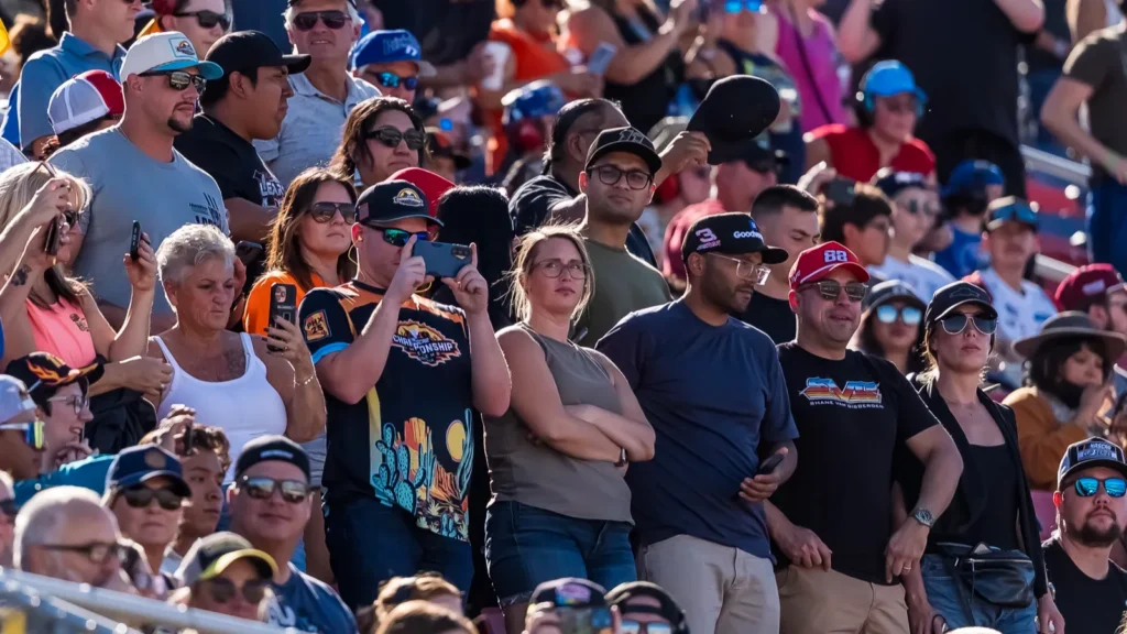 fans watch their favorite drivers race during the nascar cup