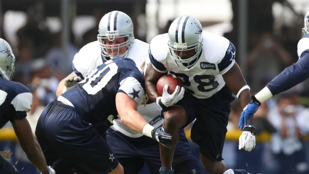 Felix Jones breaks tackles during the match