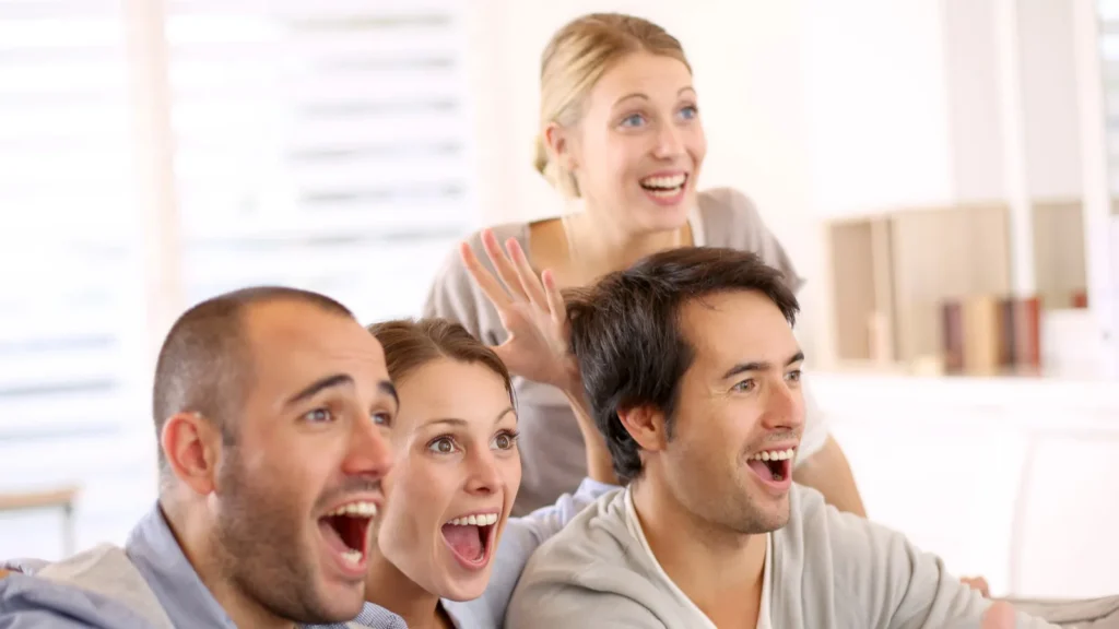 Group of friends watching football
