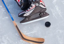 Paul Maurice approaches 2,000 games in coaching career Hockey Stick and Puck on the Ice Rink