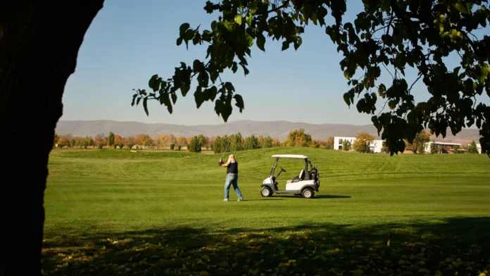 A golfer taking a swing