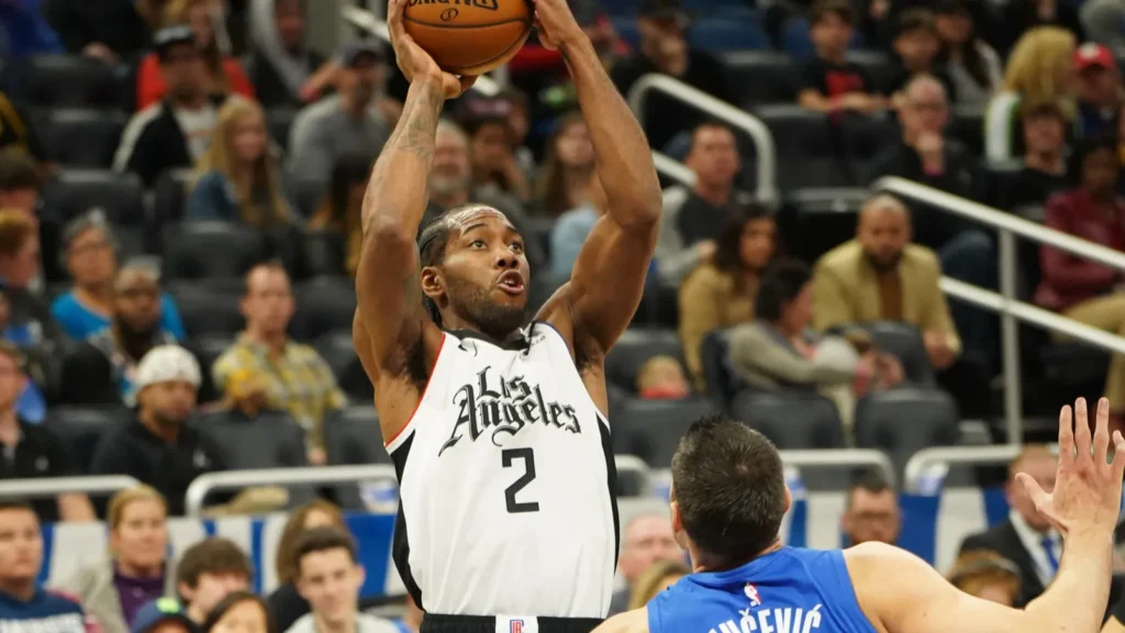 la clippers forward kawhi leonard 2 shoots a three point