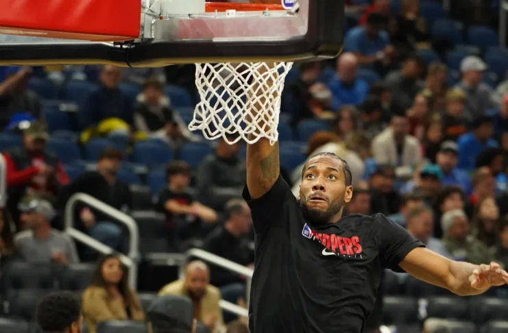 LA Clippers player Kawhi Leonard 2 makes a dunk