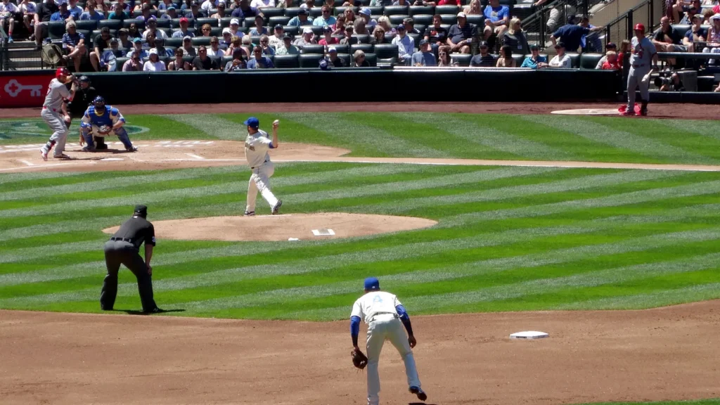 Mariners pitcher steps forward to throw pitch
