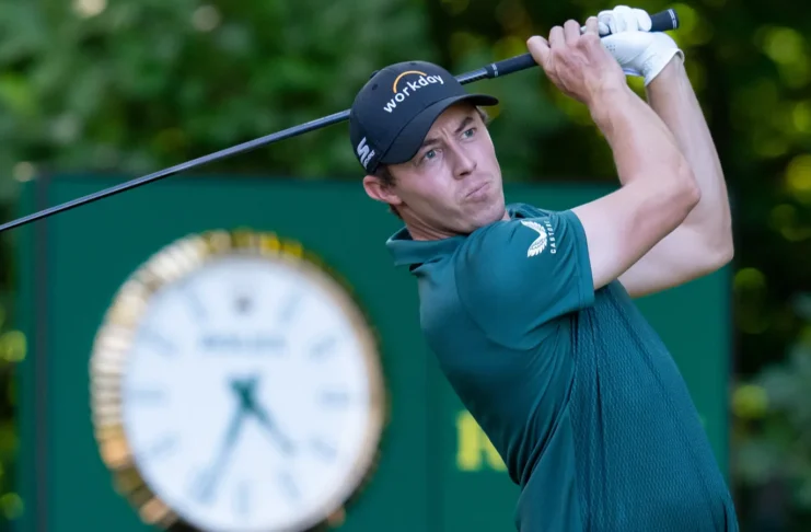 Matt Fitzpatrick in action during a golf game.