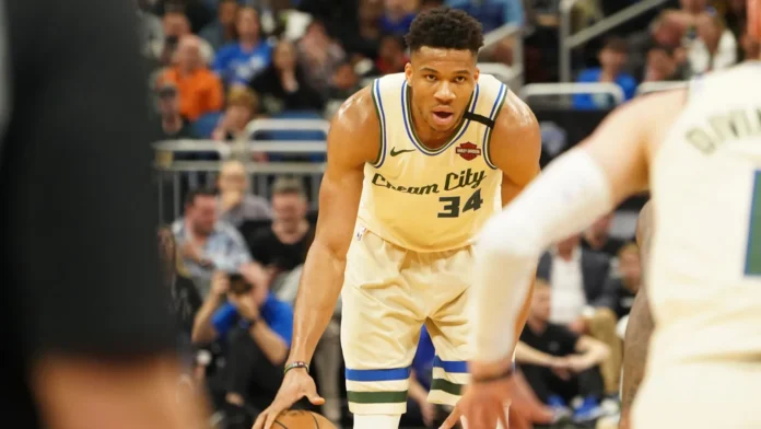 milwaukee bucks player giannis antetokounmpo 34 eying his team mate milwaukee bucks player giannis antetokounmpo 34 eying his team mate
