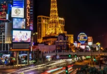NBA owners approve steps toward expansion in Seattle and Las Vegas Night shot long Exposure Strip view with Eiffel Tower in Las Veg