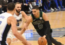 Steph Curry and Jayson Tatum’s golf outing grabs attention as Celtics rumors continue Jayson Tatum of Boston Celtics playing basketball in the court against oponents.