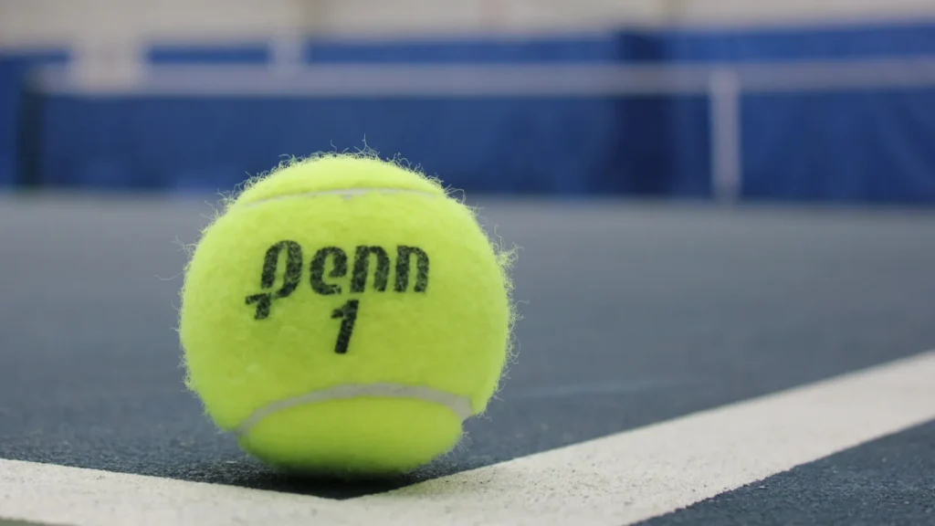 penn tennis ball at indoor court