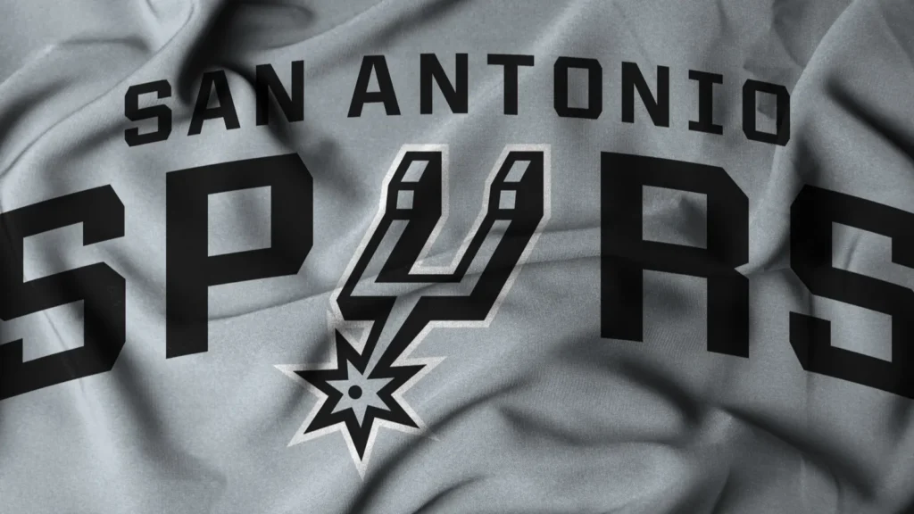 pringsewu Lampung October 16 2024 Selective focus waving flag of Basketball Club San Antonio Spurs fabric texture NBA 3d illustration