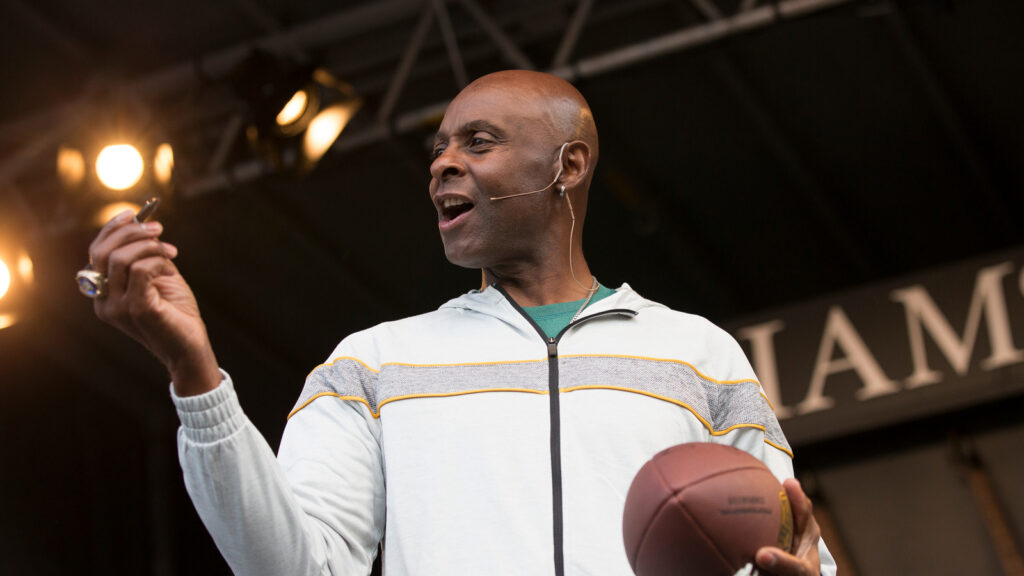 Jerry Rice speaking at an event