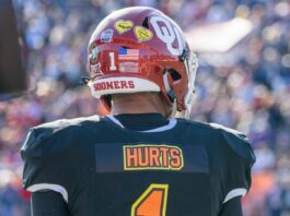 NFL fans debate Jalen Hurts hit after late sideline collision with Bears Jalen Hurts looks onto the field