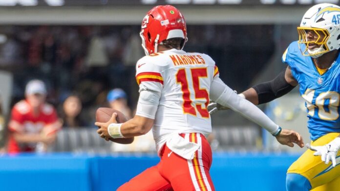 Kc,Chiefs,Quarterback,Patrick,Mahomes,#15,Runs,To,Escape,A Patrick Mahomes runs to escape a tackle