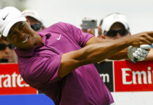 Why the Tiger Woods and Nike breakup was the end of an era Tiger Woods playing a tee shot wearing Nike
