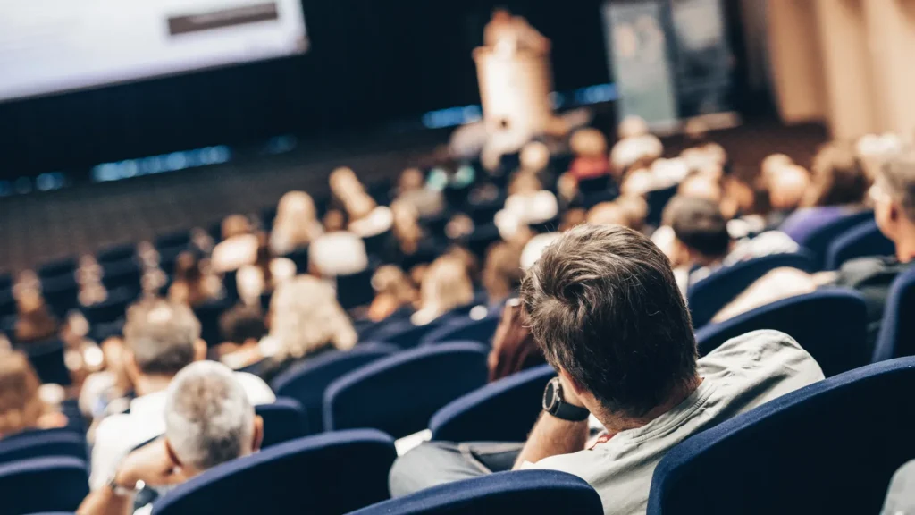 Speaker giving a talk on scientific conference Audience at the conference hall Business and Entrepreneurship concept