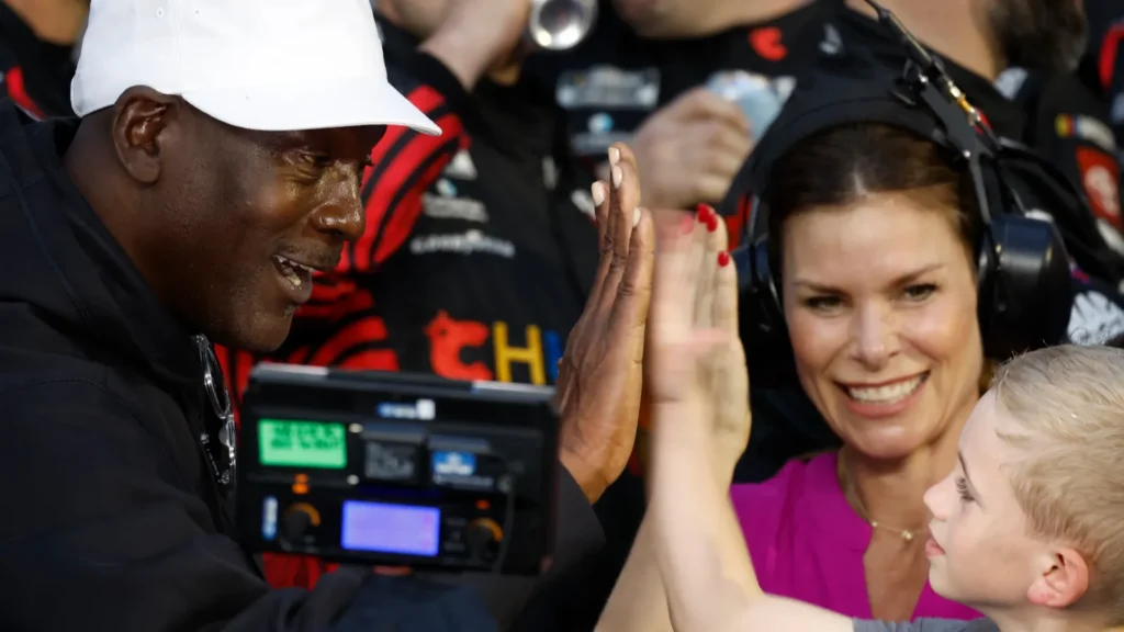 team owner michael jordan celebrates with his team as tyler