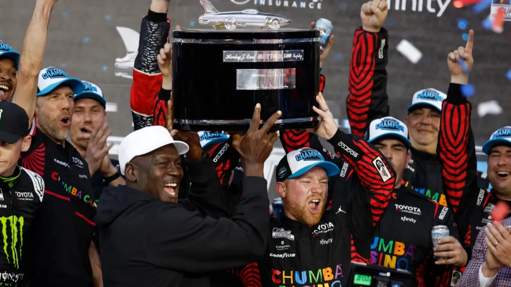 team owner michael jordan celebrates with his team as tyler