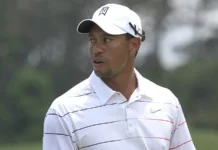 Tiger Woods on the field during a golf game.