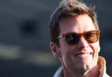 Tom Brady smiling into the camera