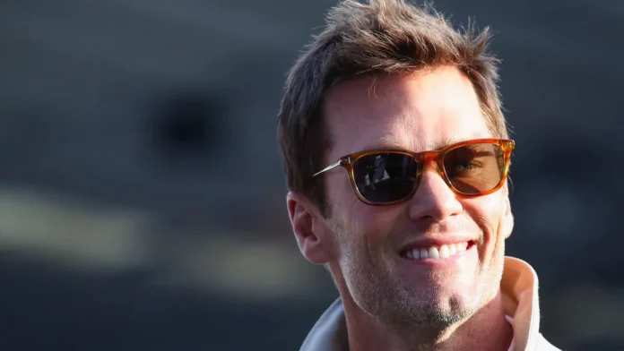 Tom Brady smiling into the camera