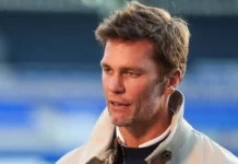 Tom Brady’s flag football project faces dispute over funding and relocation changes Tom Brady is interviewed prior to the Sky Bet League match