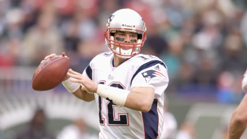 Tom Brady preparing to throw football during the game.
