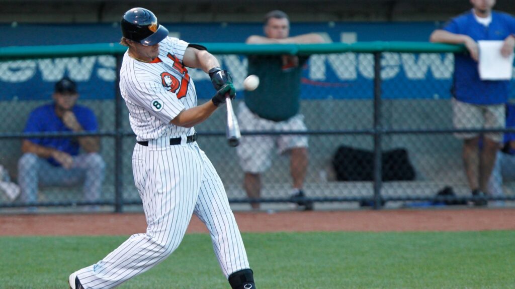 Long Island Ducks infielder Brandon Sing (23) singles against the Sugar Land Skeeters