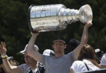 Jonathan Quick set for final game as he announces retirement Goalie Jonathan Quick holding the Stanley Cup.