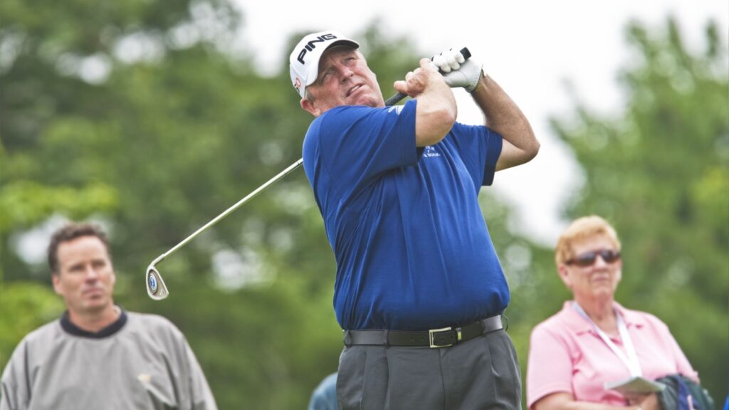 Mark Calcavecchia mid-swing during a pro-am event at the Canadian Open golf.