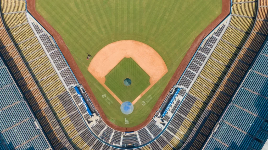 A vertical topdown drone shot looks directly onto the infield at Dodger Stadium