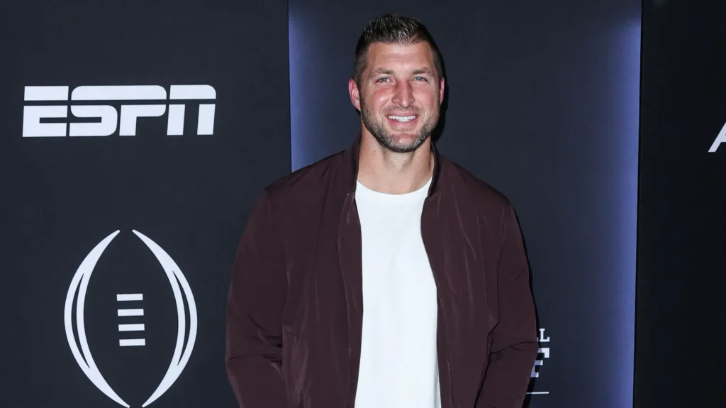 American football player Tim Tebow arrives at ESPN And CFPs Allstate Party At The Playoff Event 2023 held at The Majestic Downtown on January 7 2023 in Los Angeles California United States