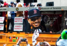 Dismissed Boston Red Sox coaches asked to leave team hotel following staffing changes Boston Ma October 31 2018 Boston Red Sox Players and Mookie Betts on a bus on Tremont Street celebrating in the Red Sox Championship parade in Boston Massachusetts