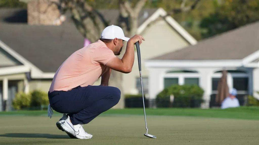 Brooks Koepka analyzing the golf course
