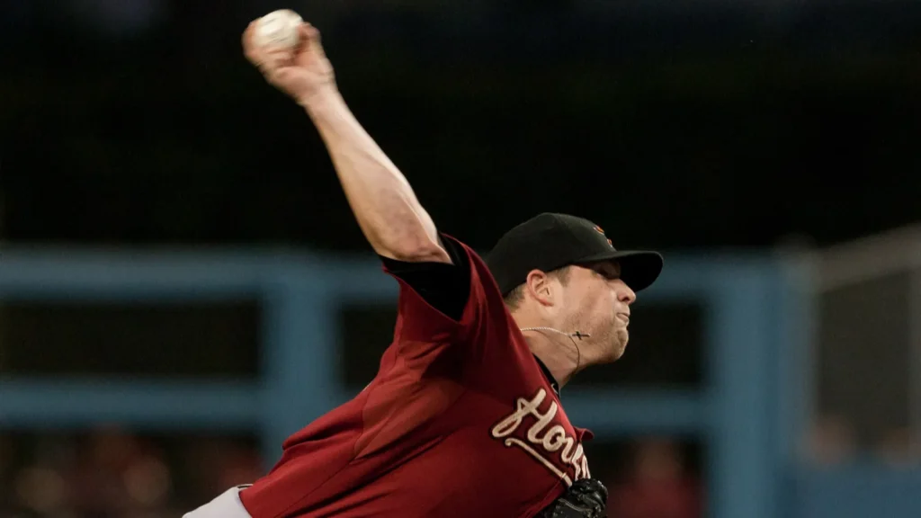 Bud Norris pitches during the game