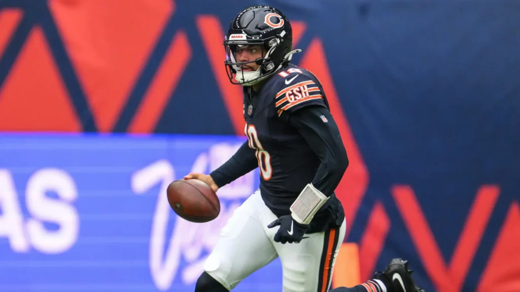Caleb Williams of the Chicago Bears breaks down field for a first down during the Week 6 match; Chicago Bears vs Jacksonville Jaguars, at Tottenham Hotspur Stadium, London, United Kingdom.